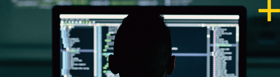 A developer working on a data interface, symbolizing the growing importance of first-party data in privacy-first digital advertising.